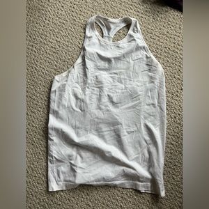 White lululemon tank with back detail size 10